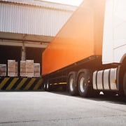 Truck at loading dock with no flexible conveyor