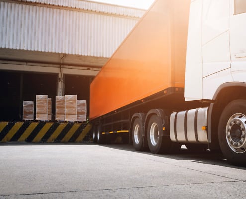 Truck at loading dock with no flexible conveyor